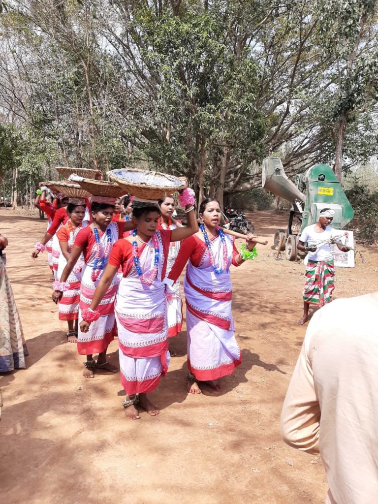 Women of Debardanga village performing dance depicting their daily routine